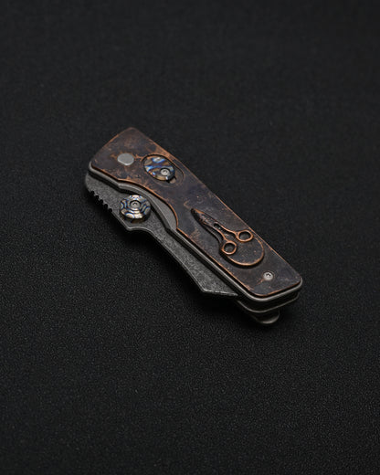 Serge Knives Guppy Custom – Copper Plague Doctor Inlay / Antiqued W2 Blade / Heat-Anodized Titanium – Made in USA