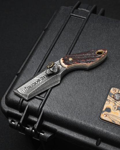 Wtopia ONE-OFF 2026 Seki exclusive custom EDC pry bar made in Japan, featuring a G3 laminated steel body, Japanese deer antler handle, 925 sterling silver skull, bronze apricot blossom decoration and bronze rivets