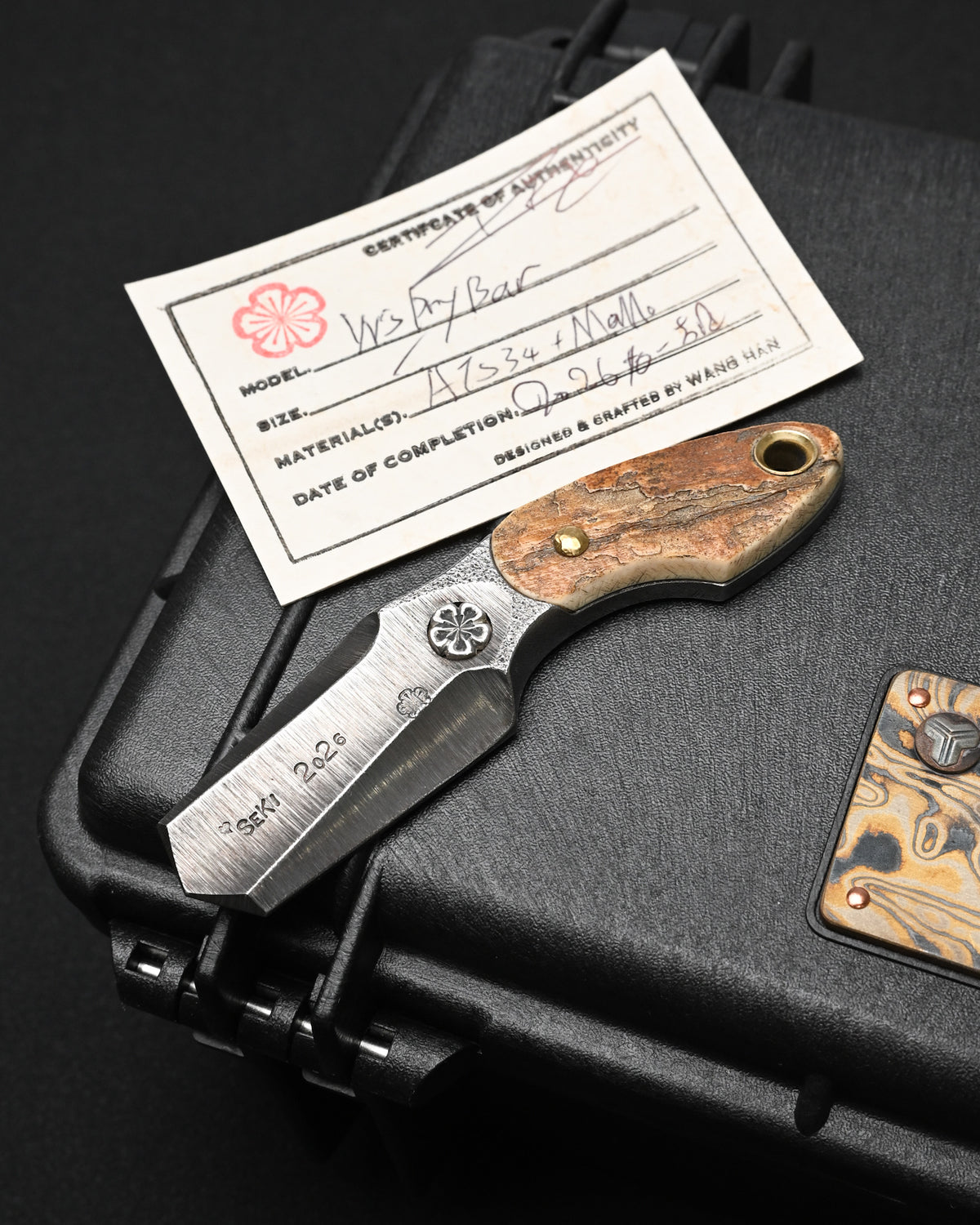 Wtopia ONE-OFF 2026 Seki exclusive custom EDC pry bar made in Japan, featuring ATS-34 steel, a mammoth ivory handle, 925 sterling silver apricot blossom inlay and bronze rivets