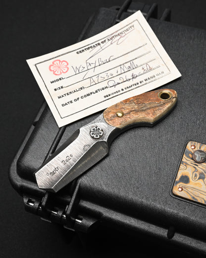 Wtopia ONE-OFF 2026 Seki exclusive custom EDC pry bar made in Japan, featuring ATS-34 steel, a mammoth ivory handle, 925 sterling silver apricot blossom inlay and bronze rivets